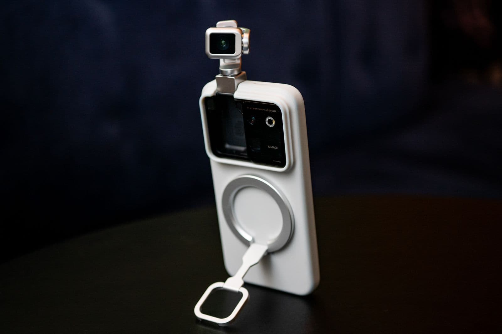 Honor Robot Phone propped on its magnetic ring stand with the gimbal camera deployed